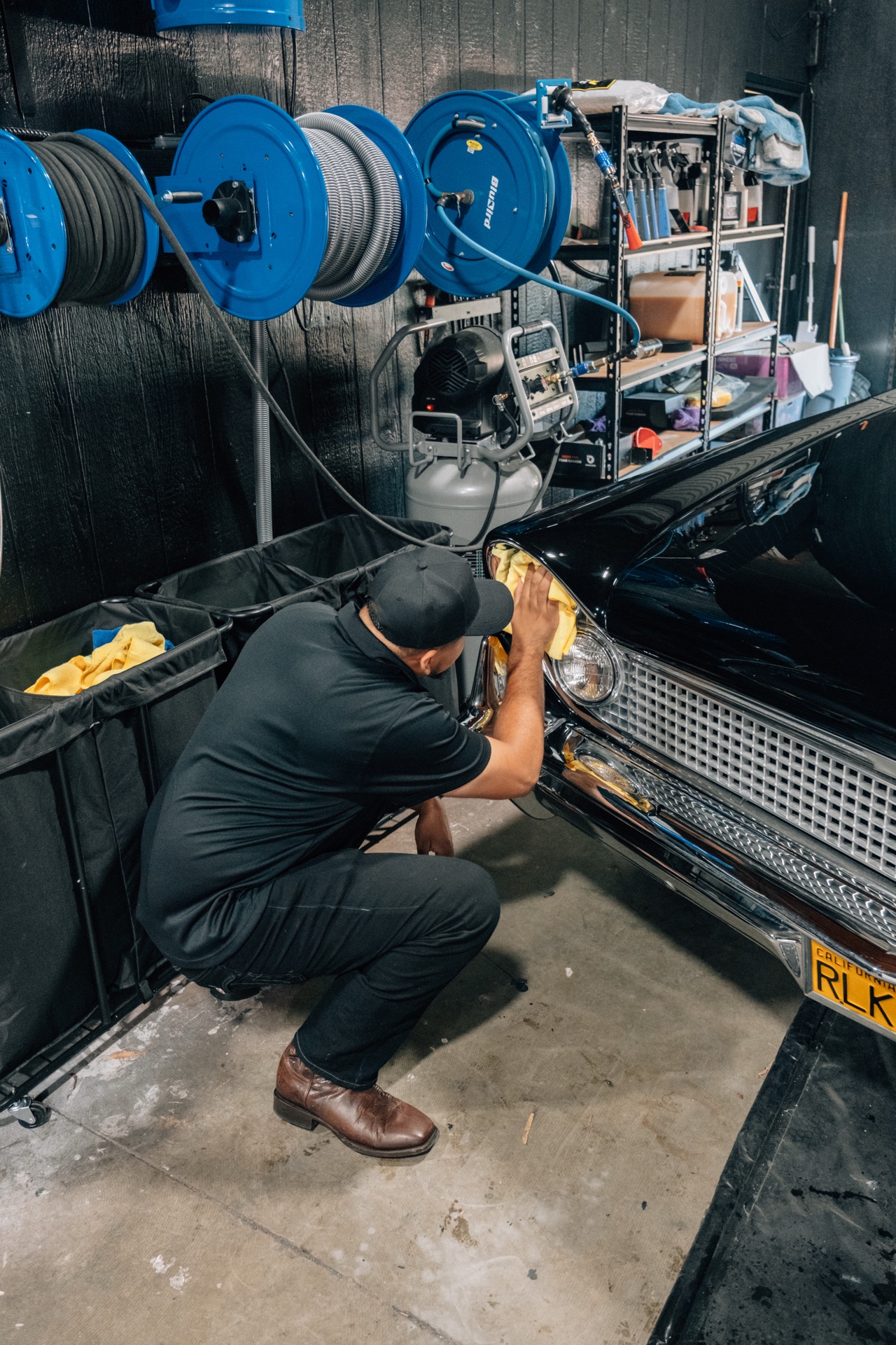 Technician detailing a lower front bumper